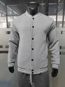 Close-up of grey men's fleece varsity jacket with white striped ribbed collar and cuffs.