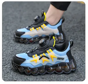 Detail view of boys breathable sneakers with rotating buckle and chunky sole