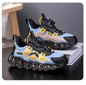 Stylish boys blue breathable chunky sneakers featuring a modern rotating buckle system