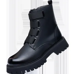 Detail showing triple nylon straps and metal buckles on black leather Martin boot