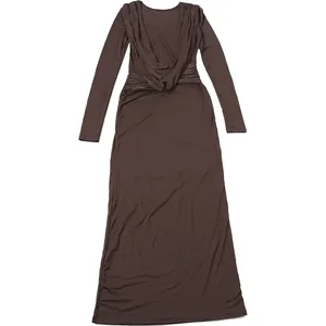 Elegant brown slim fit long sleeve maxi dress featuring a sexy draped backless design.