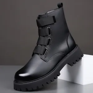 Sleek black leather motorcycle work boots with rugged lug sole and stylish strap details