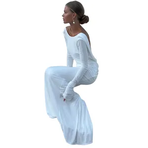 Elegant long sleeve white backless maxi dress showing side view detail and slim fit