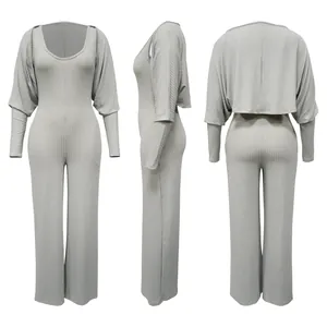 Grauer hoch elastischer gerippter Jumpsuit mit passendem langärmeligem Bolero-Set in Dreifachansicht