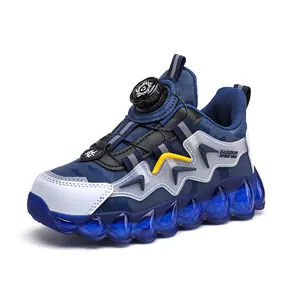 Boys navy blue camo sports shoes with rotary dial lacing and translucent blue sole