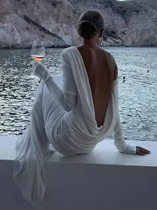 Elegant white backless long-sleeve evening maxi dress with sexy cowl back design