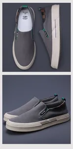 Vue détaillée de chaussures en toile grise pour hommes, design bas avec semelles plates.