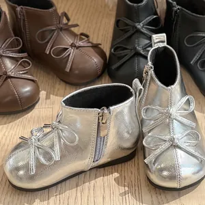 Stylish baby girl bow knot martin boots in silver, brown, and black high-top style.