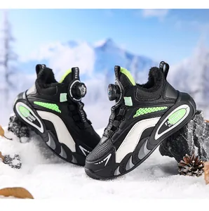 Detail showing boys winter sneakers with fleece lining and rotating dial in snow