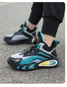 Close-up detail of boys' winter running shoes featuring a rotary buckle and warm teal plush lining