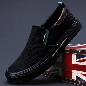 Chaussures sans lacets noires pour hommes en toile avec une texture à côtes chic