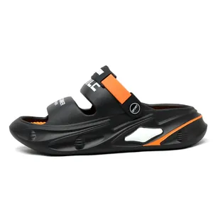 Side view detail of black and orange men's thick sole sport outdoor sandal and clog