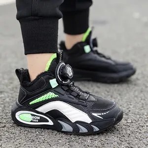 Black children's winter sneakers featuring warm fleece lining and vibrant green accents