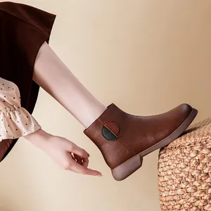 Comfortable brown leather winter ankle boots with warm lining and non-slip soles