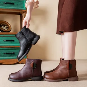 Warm fleece-lined women's winter leather ankle boots in black and brown colors