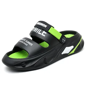 Detailed side view of black and neon green men's summer beach sandals with thick soles