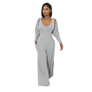Eleganter hellgrauer hochstretchiger Rippstrick-Jumpsuit mit passendem langärmeligem Bolero