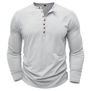 Men's light grey slub fabric long sleeve Henley shirt featuring natural wooden buttons detail