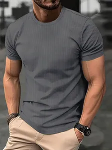 Detailed macro view of men's slim fit grey T-shirt with seersucker texture