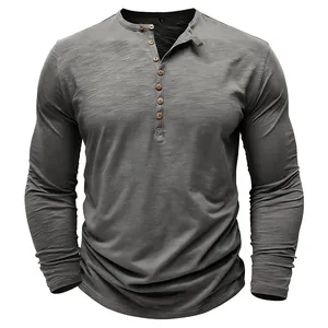 Men's casual gray long sleeve Henley t-shirt featuring slub texture and wooden buttons.