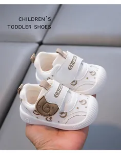 Detail shot of breathable white toddler walking shoes with Chidier brand strap detail