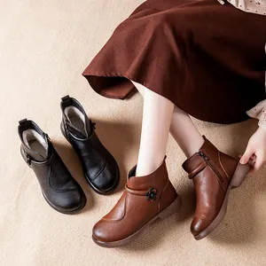 Warm winter ankle boots for women with plush lining and decorative flower