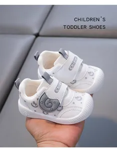 Detailed view of breathable white toddler shoes featuring mesh fabric and soft Velcro straps
