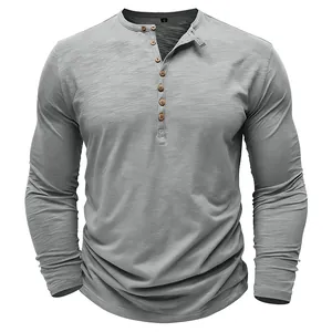 Front view detail of a gray slub fabric Henley long-sleeved T-shirt for men