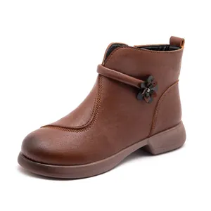 Comfortable brown leather winter short boots for women featuring a stylish decorative flower
