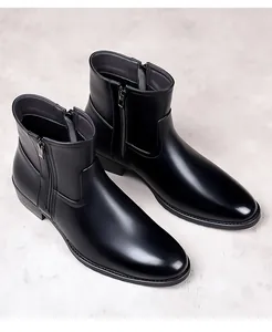 Classic black leather boots for men featuring a side zipper and elegant British style