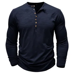 Detailed view of a navy blue long-sleeve slub fabric Henley shirt with wooden buttons