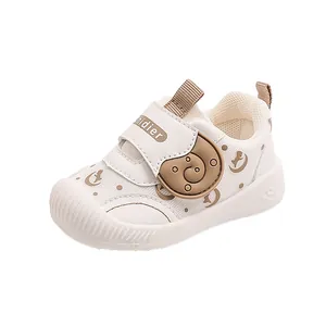 Breathable white mesh baby sneakers with soft soles and anti-slip velcro walker shoes