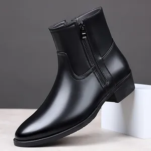Side view of elegant black leather men's boot with zipper detail on minimalist background