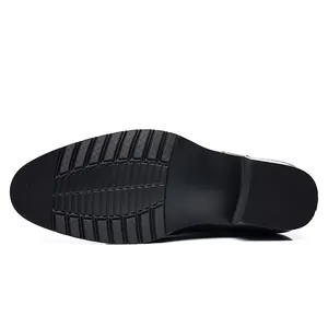 Detailed macro view of the durable anti-slip rubber sole for men's leather boots