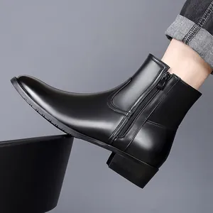 Detailed side view of premium black leather Chelsea boots for men in British style