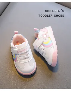 Breathable toddler walking shoes with soft pink soles and cute rainbow accents