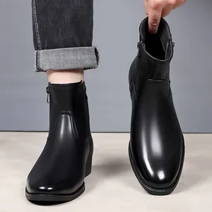 Detailed shot of black leather business boots with premium finish and side zipper
