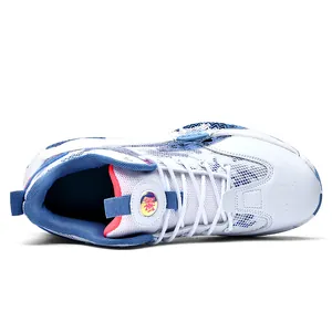 Top-down view of white and blue mesh outdoor basketball shoes with athletic laces