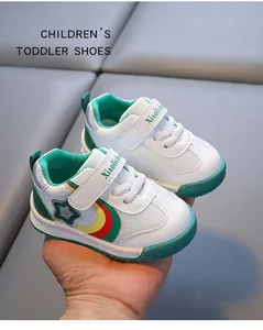 Detailed view of breathable toddler sneakers with anti-slip green soft soles