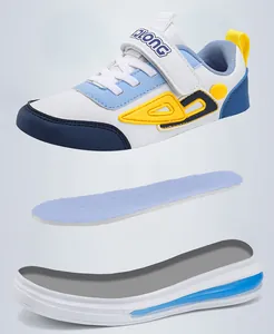 Exploded view of boys' durable leather sneakers showing sole and insole detail