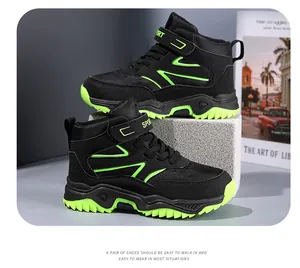 Detailed view of black and neon green high-top children's hiking sports shoes