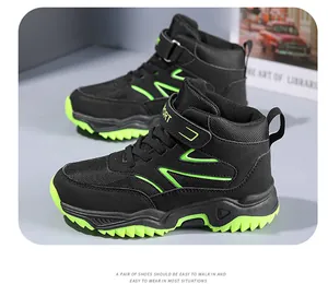 High-top children's outdoor hiking shoes in black and neon green with breathable mesh