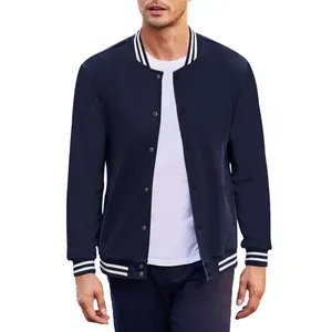 Close-up of navy blue men's varsity jacket with striped cuffs and collar details