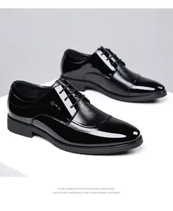 A pair of premium black patent leather men's dress shoes for formal business attire