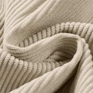Close-up detail of soft cream corduroy fabric texture for men's casual sweatshirt