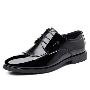 Elegant men's black patent leather dress shoes with lace-up design and pointed toe