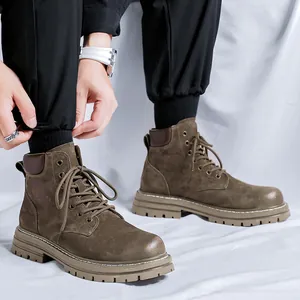 Stylish men's brown leather high-top work boots with thick rubber soles