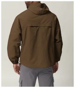 Back view of brown water-resistant hooded windbreaker jacket for outdoor activities