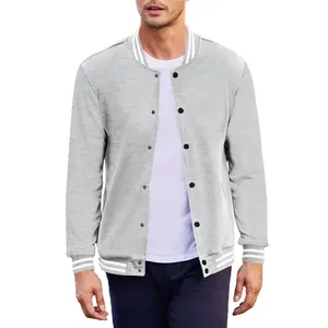 Detail view of a men's grey vintage varsity jacket with white stripes and button closure
