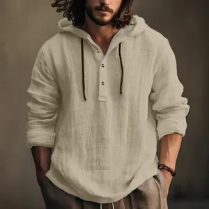 Macro view showing the textured linen-blend fabric of this men's long sleeve hooded shirt